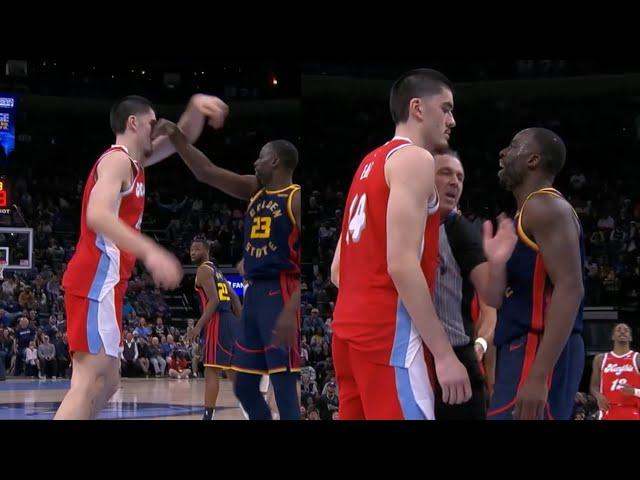 Draymond Green hits Zach Edey in his face then they get into it 