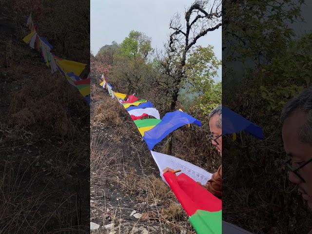 Raising Prayer flags at Samthar Village, Kalimpong