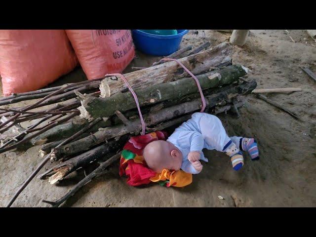 Single Mother - Picking up rice straw to make vegetable garden