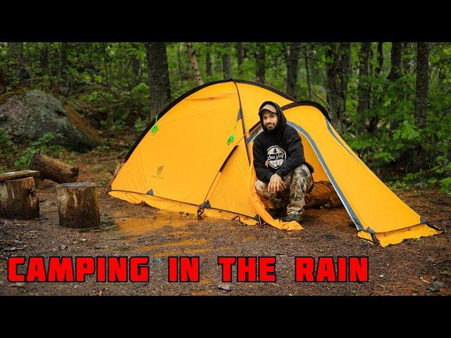 Camping In Rain With New Tent And Campfire Cooking