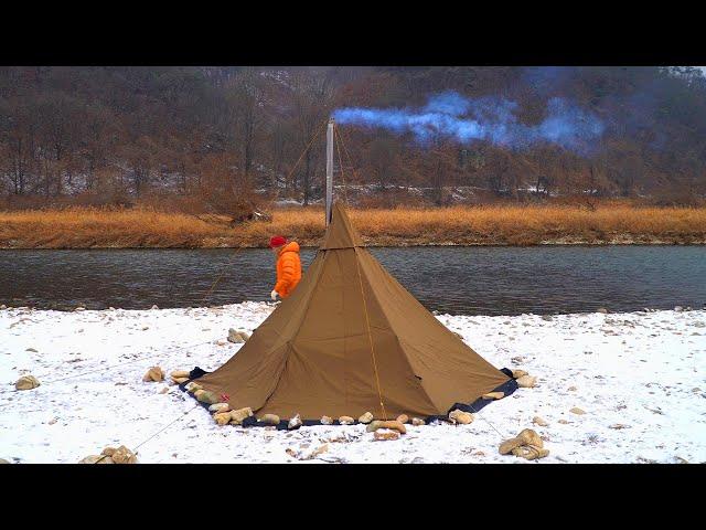 Awesome camping with a wood stove by the snowy riverside...First time using the POMOLY X Ti-5.