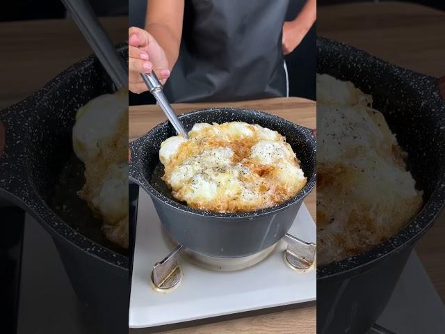 Add eggs to boiling oil! Why wasn't I told this recipe before?