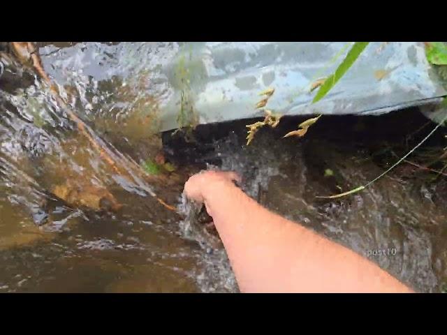 Unclogging Culvert That Washed Out Entire Road After Getting Clogged During Storm