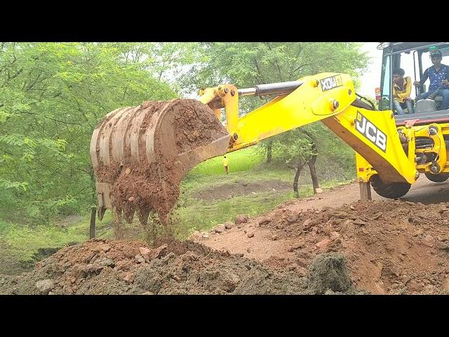 JCB machine video JCB Lifting Heavy Concrete Pipe and installing on Drain - JCB Backhoe Making Road