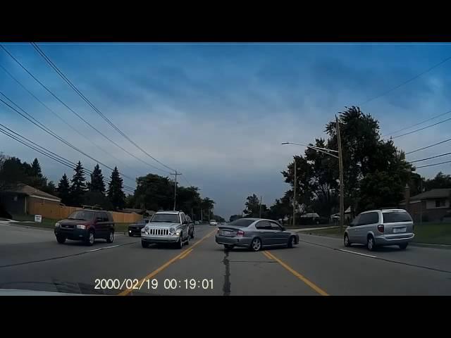 Car almost causes a pileup