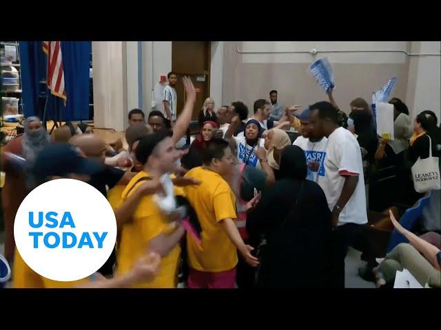 Watch: Brawl breaks out during city council meeting | USA TODAY