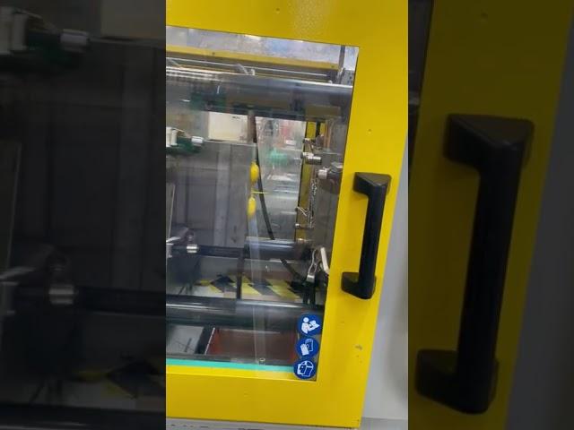 Plastic Injection Moulding Machine in action - Dudley Associates Ltd