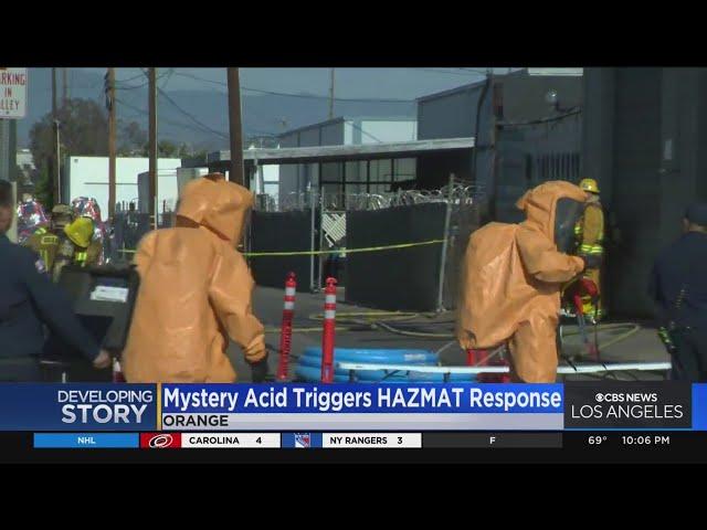 Mystery acid spill in Orange triggers HAZMAT response