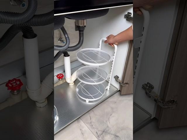 The multi-layered adjustable pot storage rack can be placed under the sink #cornerunit #tinykitchen