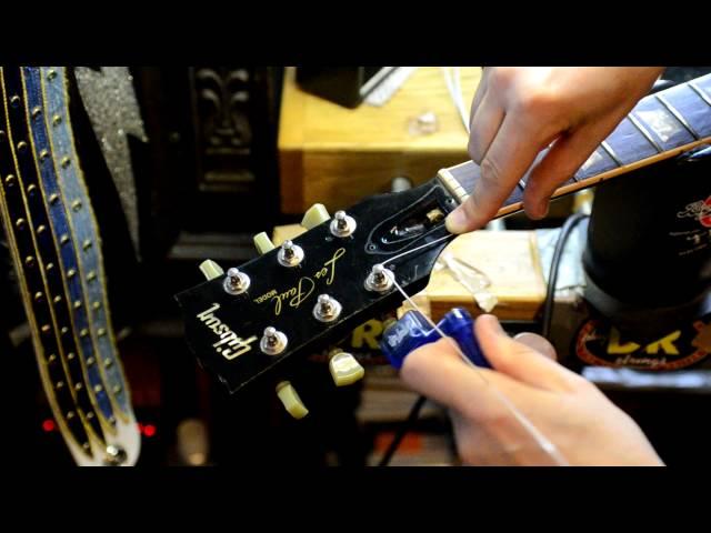 Restring a Guitar by Bill Baker filmed in HD closeup demo on MISFITS guitar Pt. 1