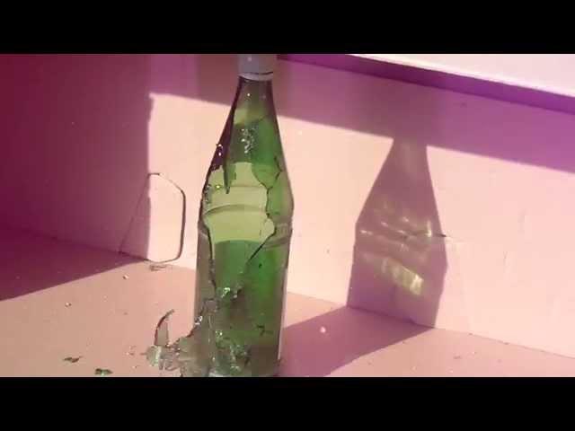 Colt Defender CO2 Pistol VS Glass Bottle