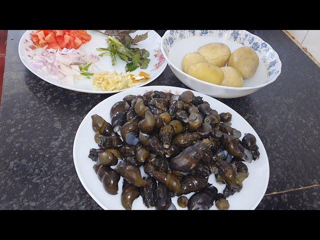 River snails with potato curry  Lai tharoi aloo thongba