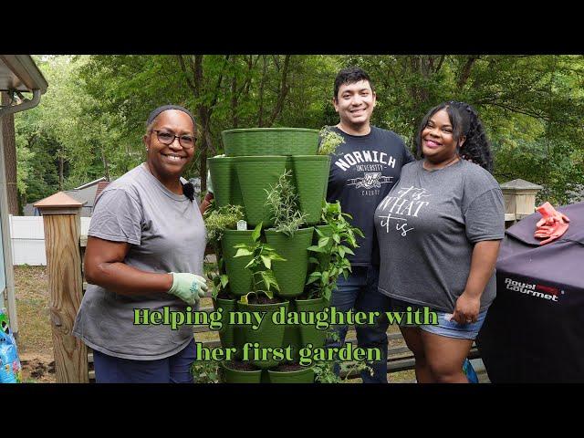 Helping my daughter setup her first garden