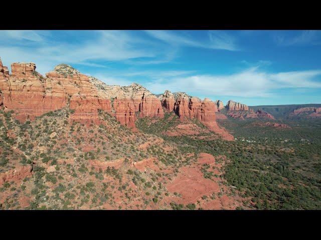 Dr.One takes flight along the red cliffs of Sedona, Arizona. 