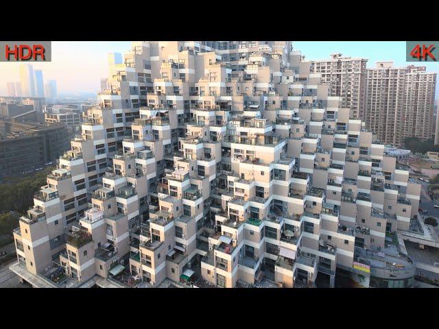 Experience China's Pyramid Apartments, Inside Like a Massive Maze.