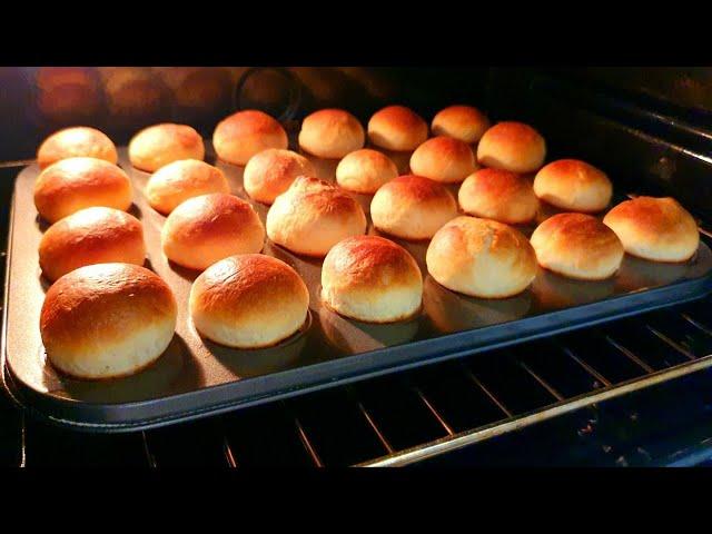 The tastiest bread made from simple ingredients. Bun. Baking bread. Helga is cooking.