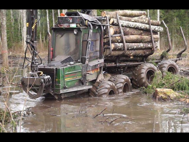 Forwarder Mini Bruunett logging in wet forest