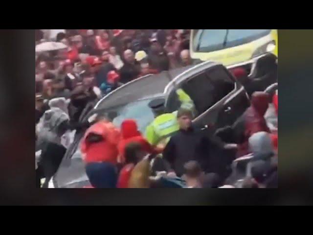 Driver plows into crowd of Liverpool soccer fans, injuring dozens