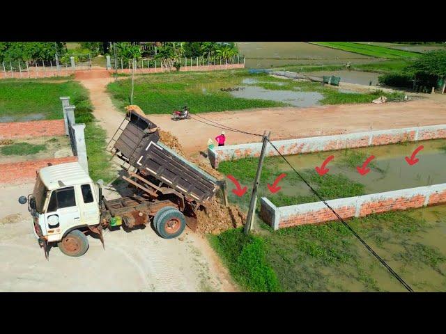 KOMATSU D20P Bulldozer and Trucks in Action: Filling Land with Precision!