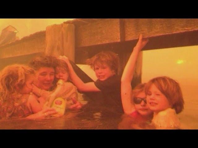 Australia fires: Family hide under jetty to escape blaze