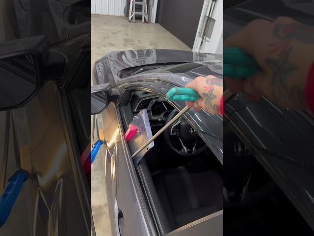 Huge door dent repair with pdr.