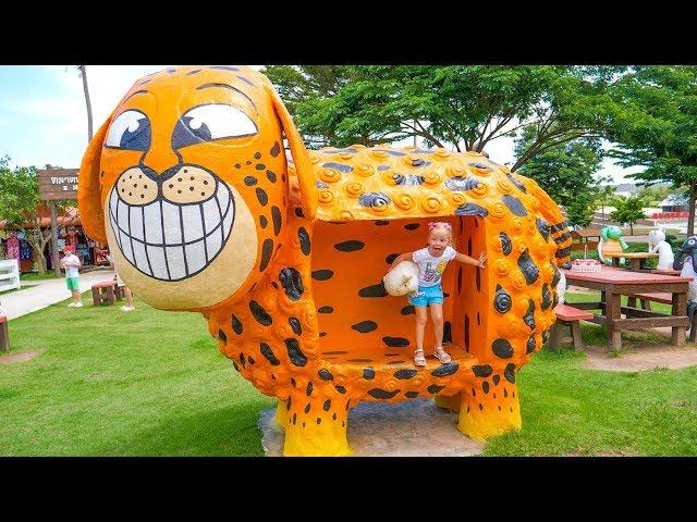 Nastya playing at the sheeps farm with funny animals and giant colored toys