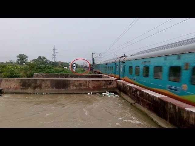 Heavy Trains Traffic Over Flooded Canal Trains Pass At High Speed