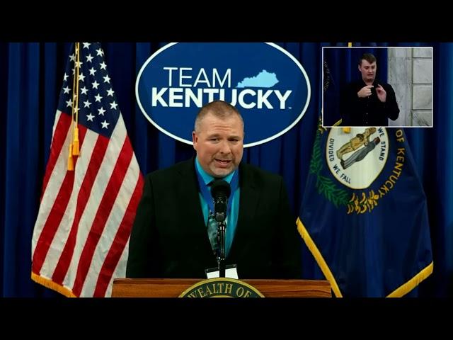 Scott Johnson accepts award from Kentucky Department of Education