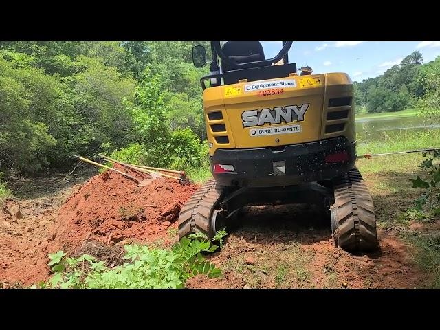 Working on putting in the culvert pipe.
