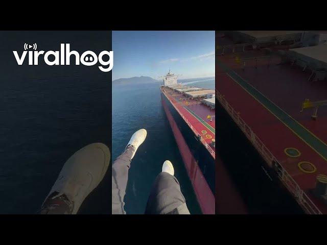 Paramotor Pilot Experiences Sudden Turbulence Over Cargo Ship || ViralHog