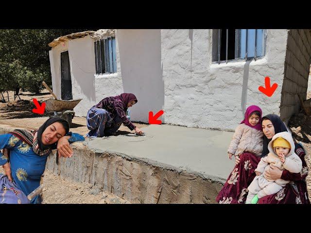 Khadija finished the cement of the cottage's porch and is thinking about the cottage's carpet.