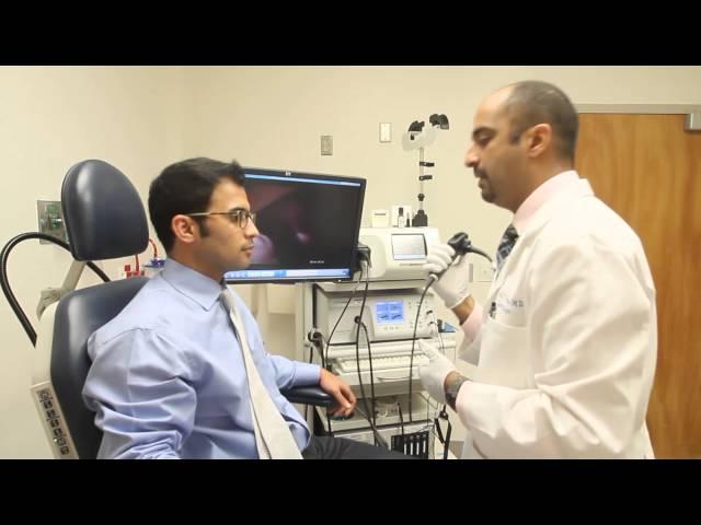 Laryngoscopy and stroboscope to examine the vocal cords