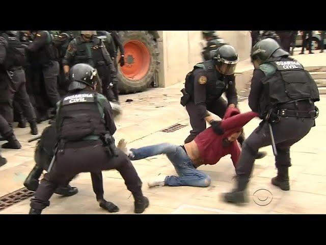 Crackdown on Catalans in Spain as they vote for independence