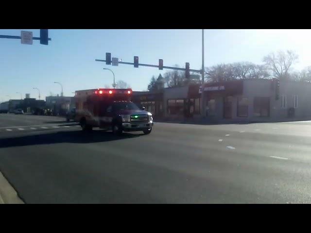 Oak Lawn Fire Department Ambulance #4 is responding code 3.