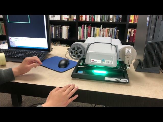 How to use a microfilm machine