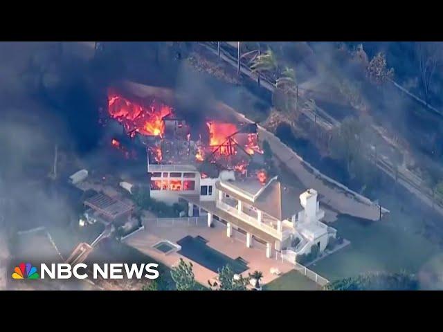 Dozens of homes destroyed by Southern California wildfires