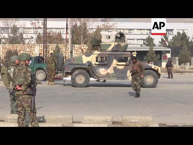 Official: gunmen battle security forces in western Kabul