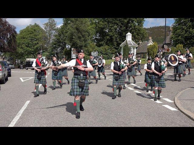 4/4 Marches by Ballater Pipe Band as they parade through Braemar in rural Aberdeenshire, Scotland