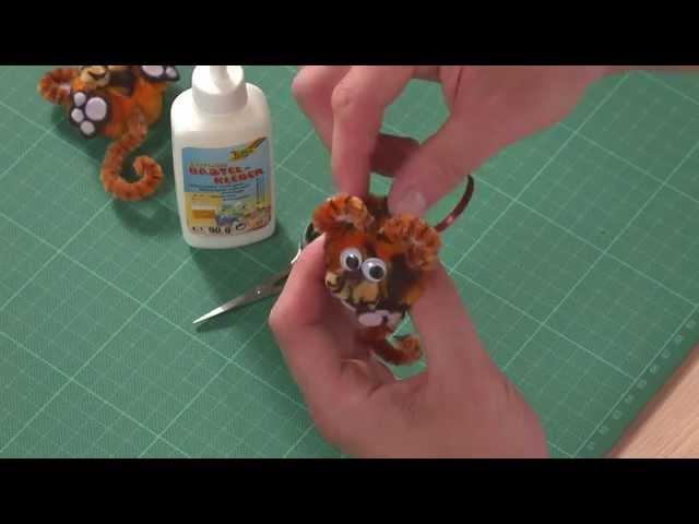 Funny animals with pompons of folia® - Manual Video Tiger