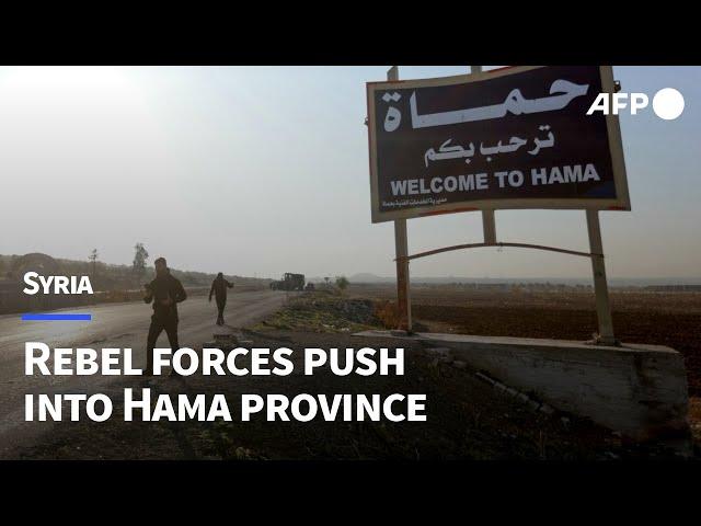 Syrian rebel forces advance past abandoned regime equipment in Hama | AFP