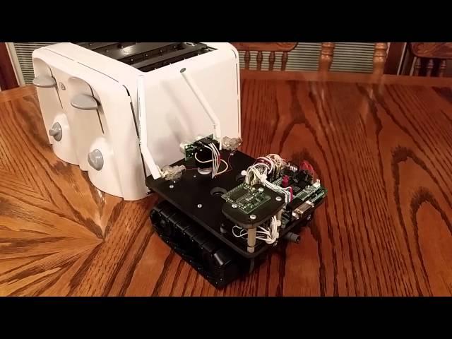 lil DrumBot, a crawling little robot that wants to play drums