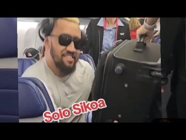 Off air footage of Nice guy Solo Sikoa breaking character to help on airplane - WWE RAW & SMACKDOWN