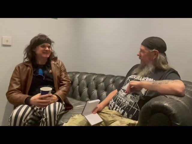 Jim Beerman talks with a member of Tragedy for TotalRock