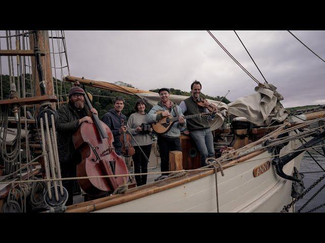 Jon Boden, Seth Lakeman, Ben Nicholls, Emily Portman and Jack Rutter on a tall ship