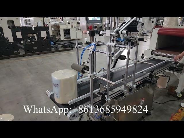 Automatic maxi roll paper handle application machine