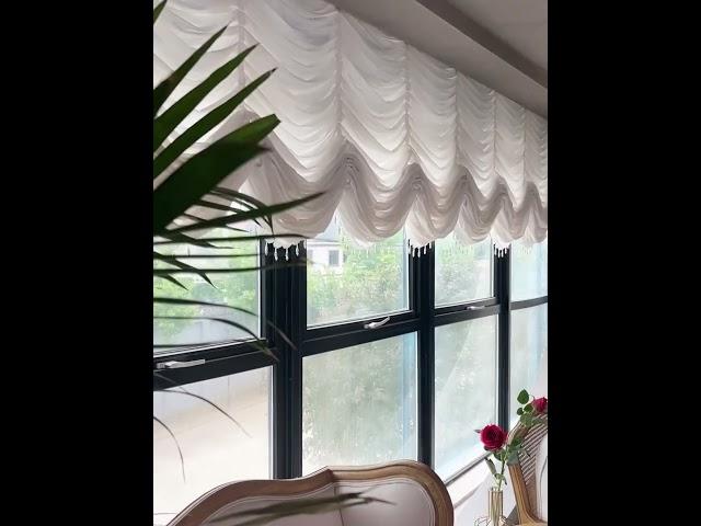 Breathe new life into your windows with the dynamic and elegant motorized roman blinds