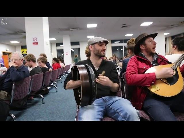 Flight delayed, so famous Irish musicians play for the passengers in jam session