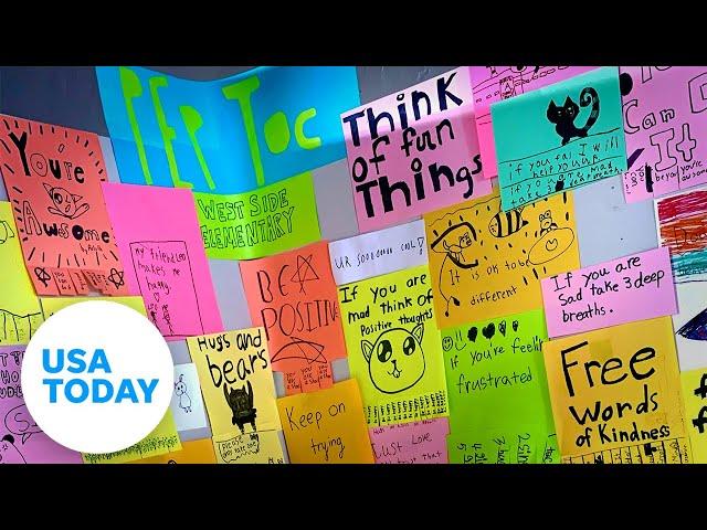 Elementary kids' art project is 'hotline' of encouraging words | USA TODAY