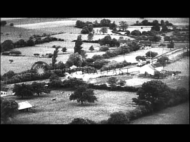 Strafing of trains, railroad yards, tug boats and barges in canals by USAAF fight...HD Stock Footage