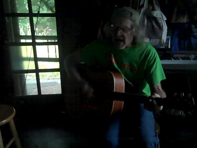 Mark Donham practicing his song, "Not My Style" at home, 7 17 22